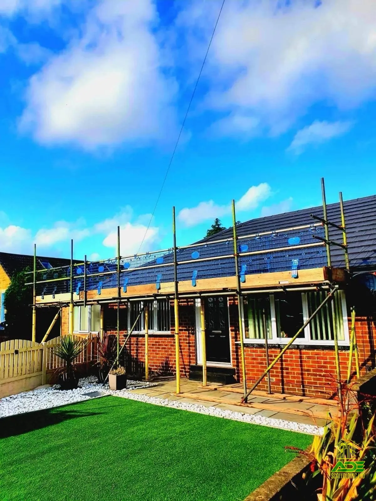 Eaves-level scaffold on a bungalow with newly tiled roof